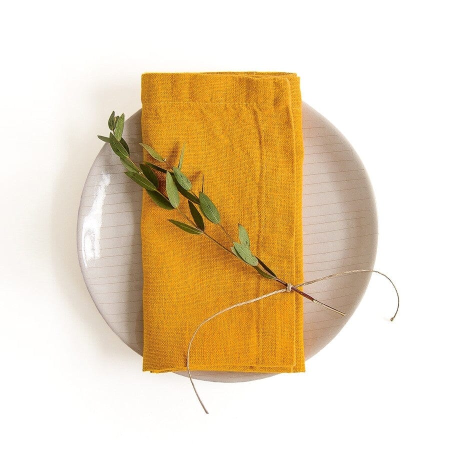 Linen Tales Mustard Napkin on a Plate