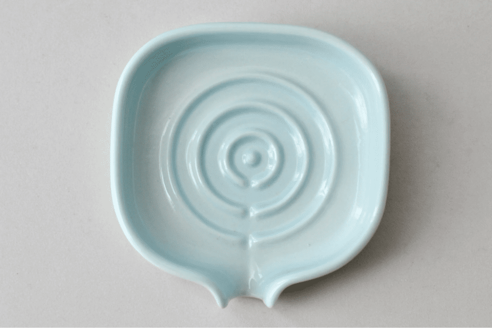 Light blue self-draining soap dish