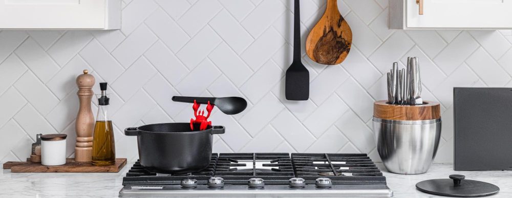 Stove top with pot and other cooking utensils